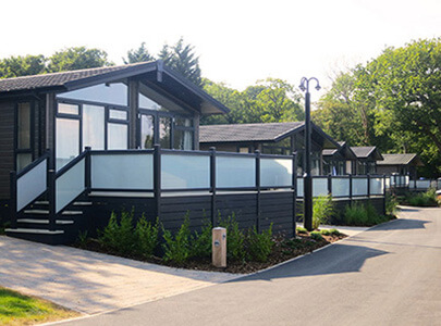 AB Sundecks Picket Glass on raised decking on a number of lodges